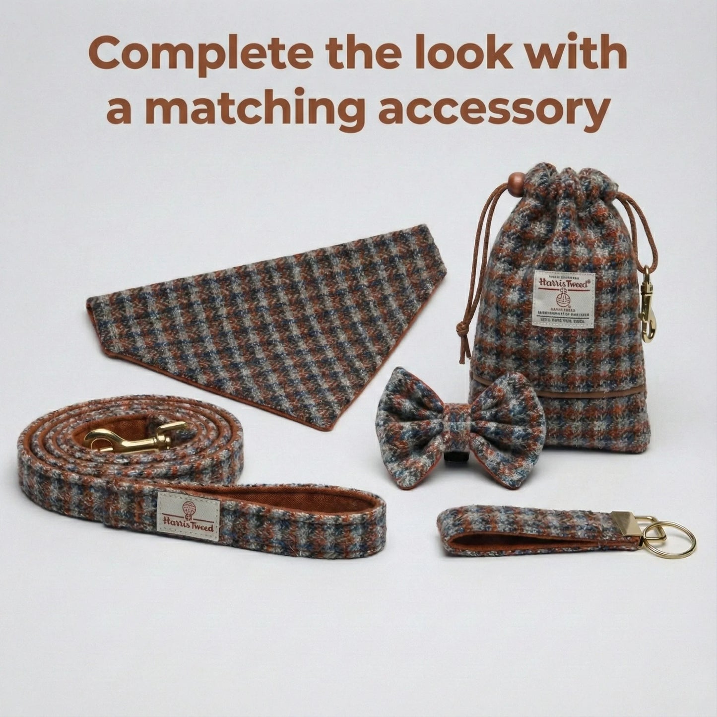 Set of matching pet accessories including a collar, leash, bow tie, and pouch on a light gray background.
