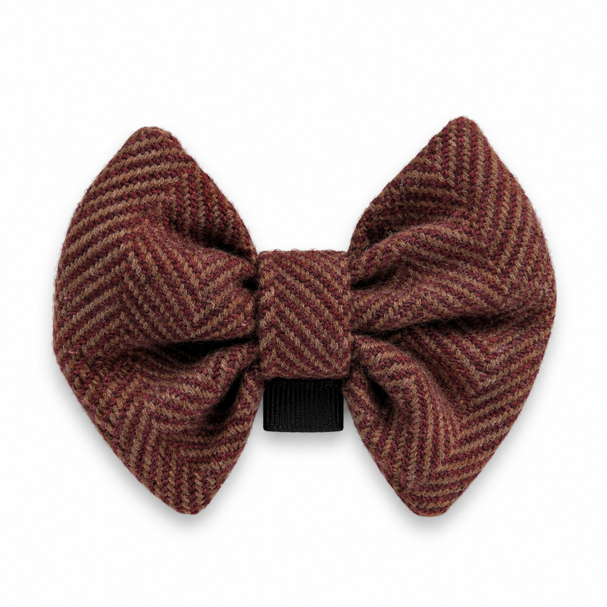A pre-tied abraham moonherringbone pattern bow tie in a red herringbone colorway, featuring a black elastic band at the center, shown against a plain white background.