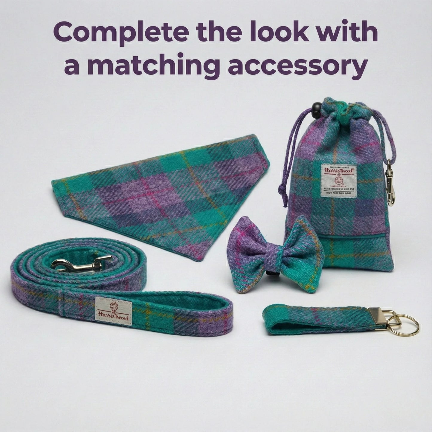 Plaid pet accessories including a collar, leash, bow tie, and pouch on a white background.