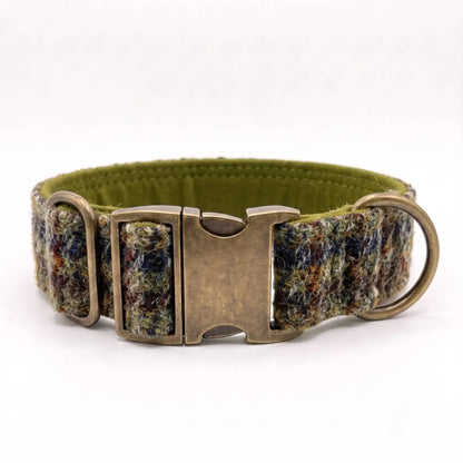 A 38mm wide dog collar with a textured, multicoloured tweed pattern in shades of green, brown, and blue, featuring an olive green inner lining and antique bronze metal hardware.
