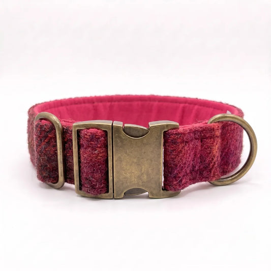 A textured tweed dog collar in a deep magenta and burgundy pattern, featuring an antique bronze metal buckle and a matching D-ring, shown on a plain white background.