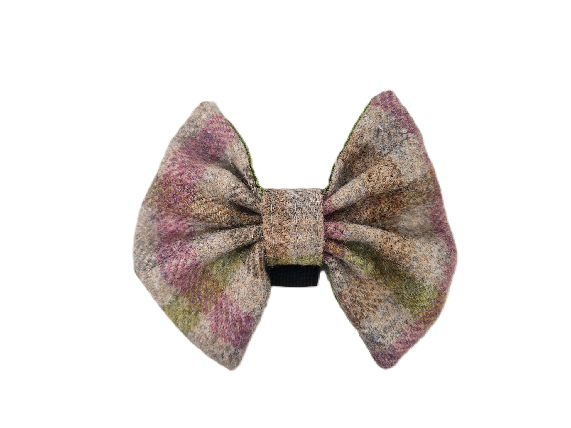 A classic double bow tie made from a textured tweed fabric with a mottled pattern of beige, brown, pink, and green, presented on a solid white background.