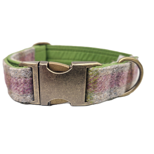 A dog collar featuring a textured, heathered fabric in shades of green, pink, and gray, with a solid olive green inner lining and an antique bronze metal buckle and ring.