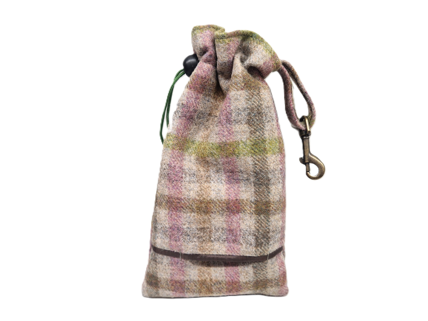 A small drawstring pouch made from a textured plaid fabric in muted pink, beige, and olive tones, with a brass carabiner clip and a green drawstring cord, shown on a plain white background.