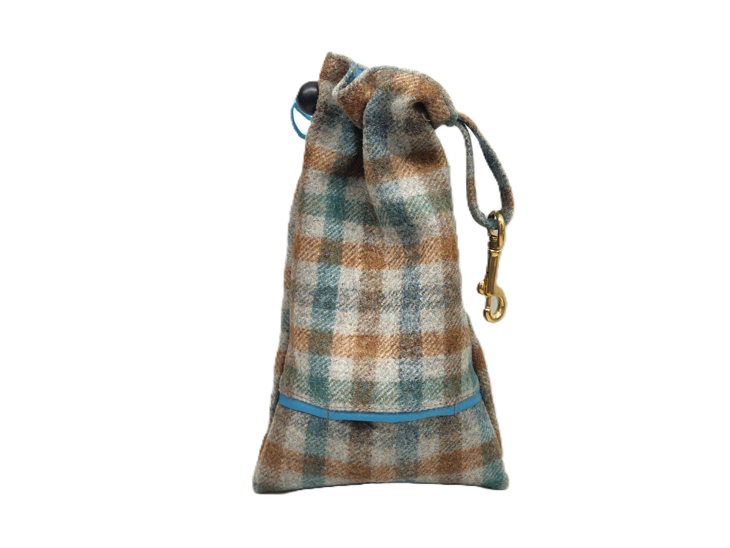 A small drawstring pouch made of plaid wool fabric in brown, beige, and teal tones, with a blue trim detail and a gold-tone metal clip on a white background.