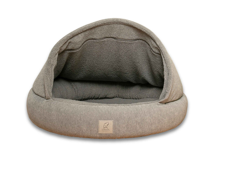 Studio image of the grey cocoon dog bed with high bolster and hooded canopy