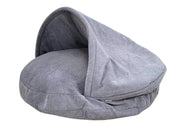 Grey dog cave bed with raised hood and plush lining on white background