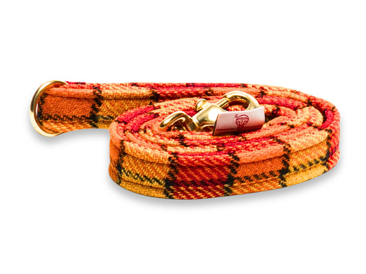Sunset Check Luxury Harris Tweed Dog Lead Made by Collared Creatures in the UK. Vibrant Orange & Yellow Designer Harris Tweed Dog Leash. High Quality and Machine Washable. Complete The Look With a Matching Harris Tweed Dog Collar.