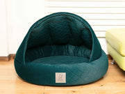Teal cocoon dog bed with hood open and no curtains, ideal for cosy lounging
