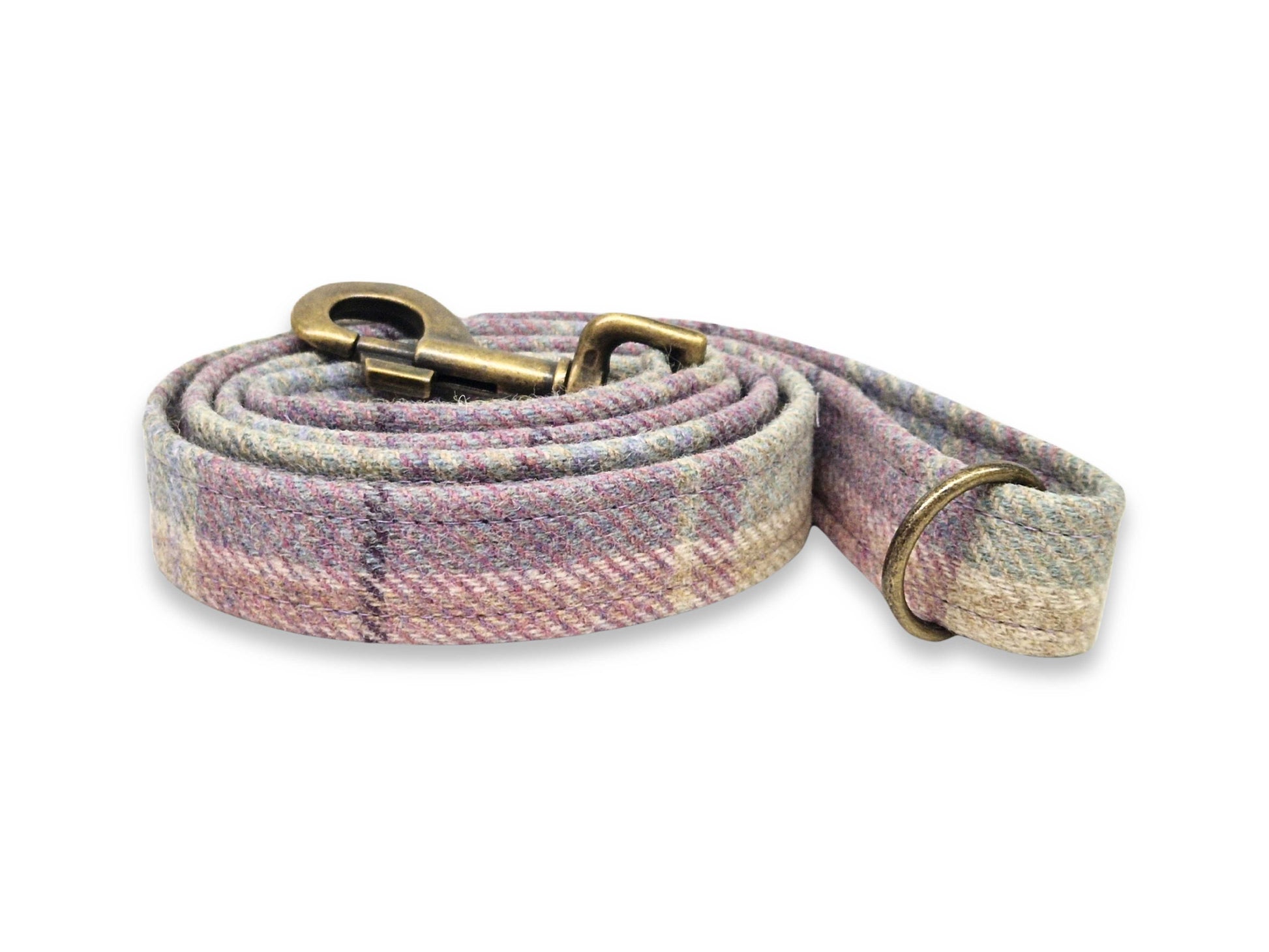 tweed dog leash with pink and beige plaid pattern on a white background