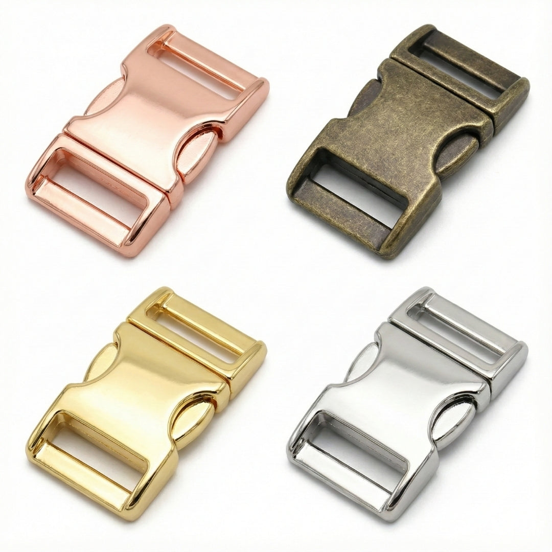 Four metallic buckles in rose gold, brass, antique brass, and silver on a white background
