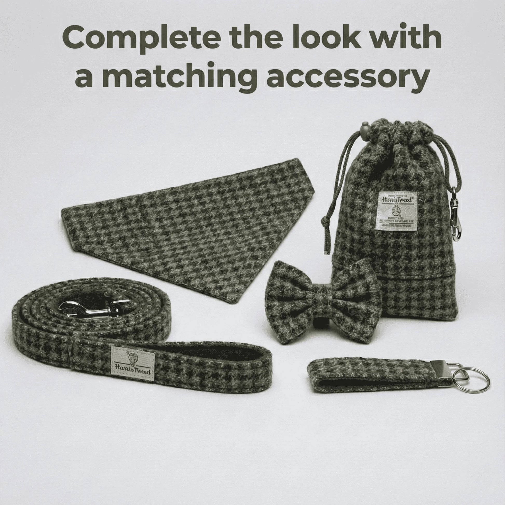 Houndstooth patterned pet accessories including a collar, leash, bow tie, and pouch on a light gray background.