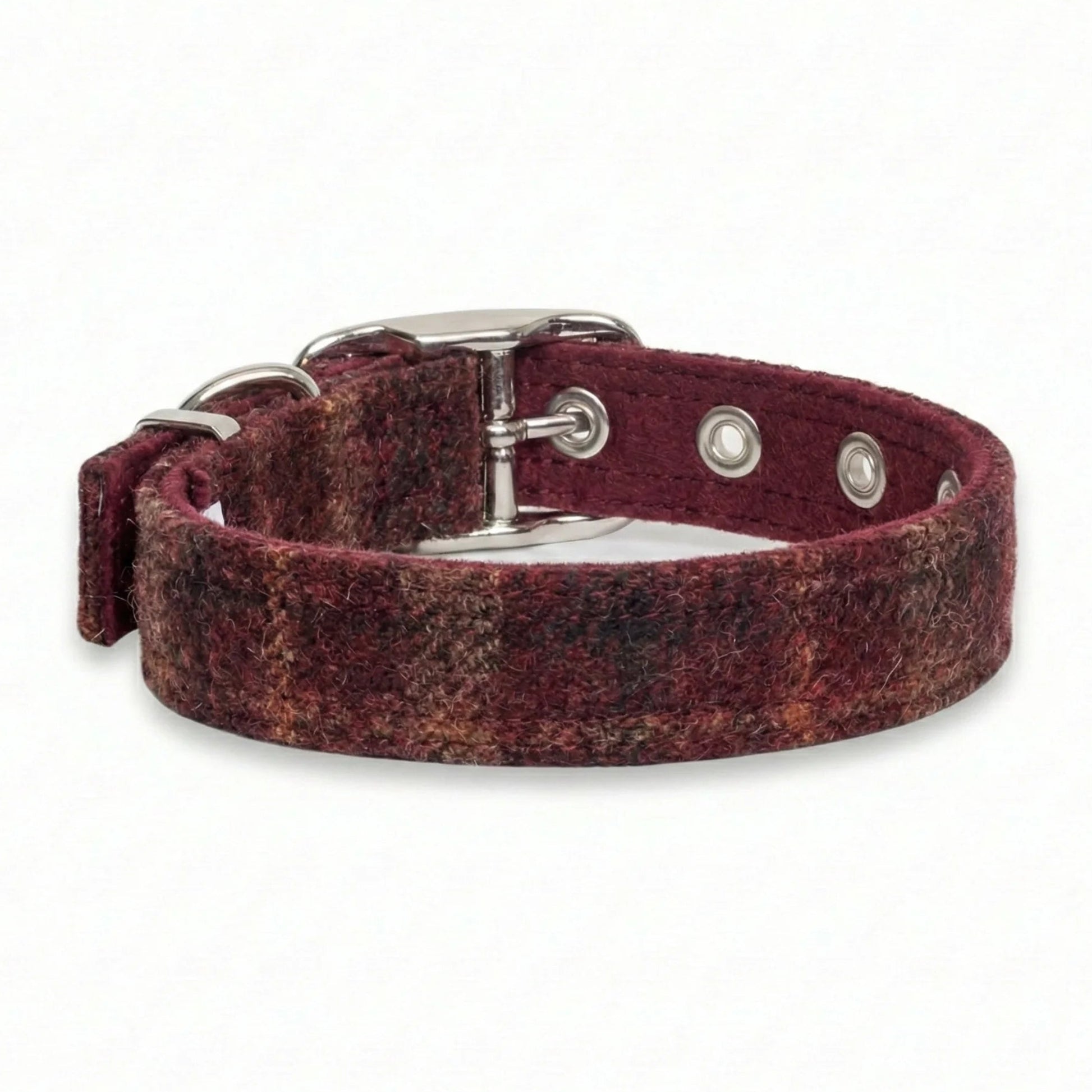 Reddish-brown dog collar with silver buckle on a white background