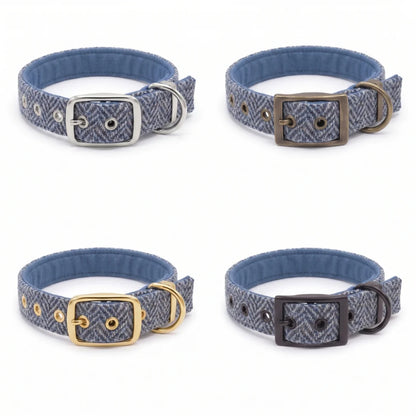 Four dog collars with blue herringbone-patterned fabric and silver-toned metal hardware, arranged in a 2x2 grid on a white background.