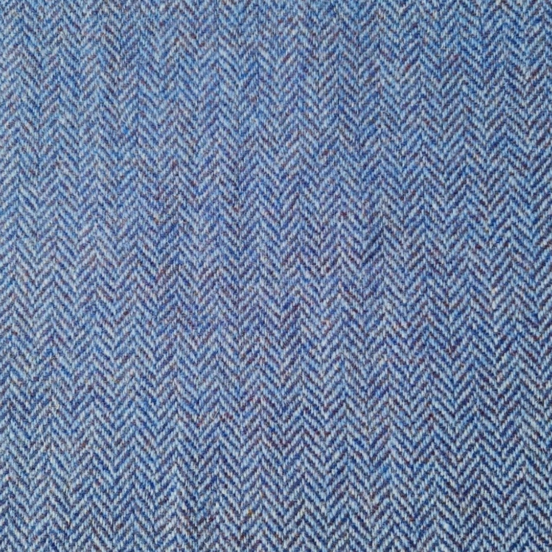 Blue herringbone pattern fabric texture