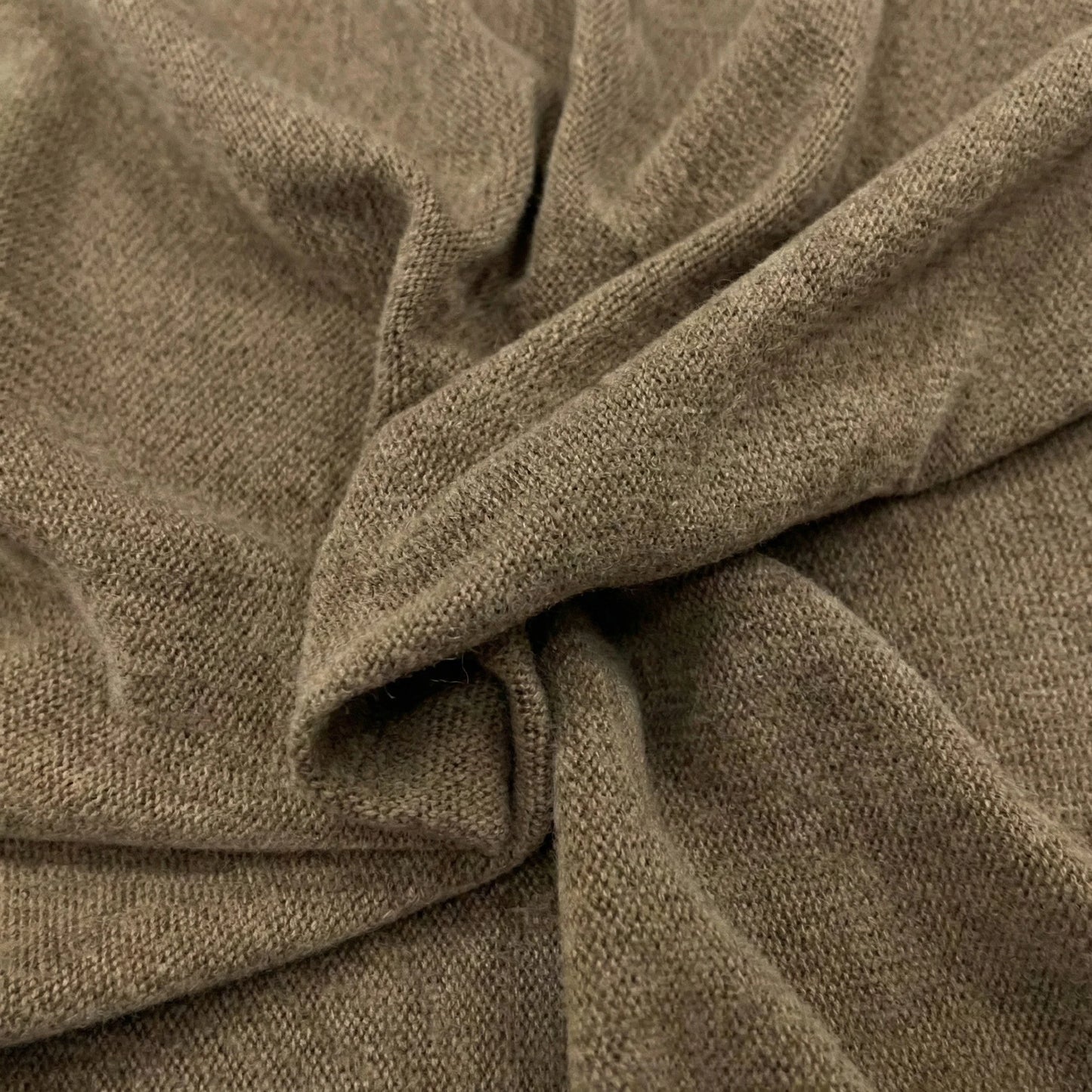 Close-up of brown fabric with a textured pattern