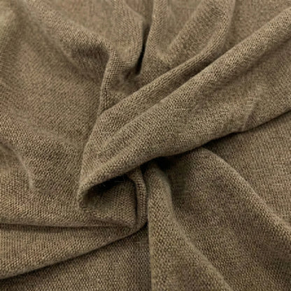 Close-up of brown fabric with a textured pattern