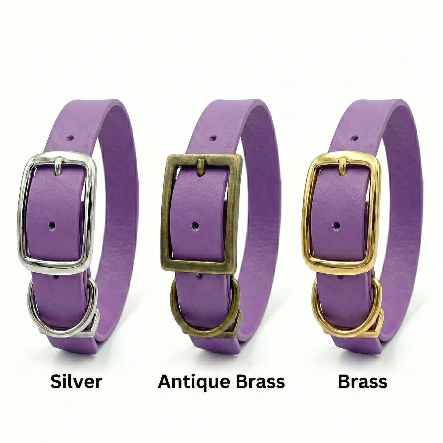 Three purple biothanedog collars with silver, antique brass, and brass buckles on a white background.
