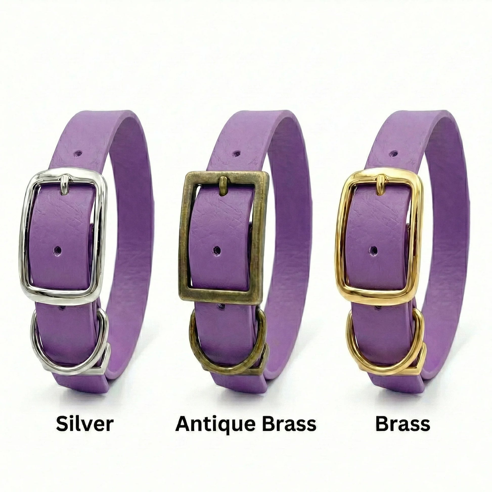 Three purple biothanedog collars with silver, antique brass, and brass buckles on a white background.