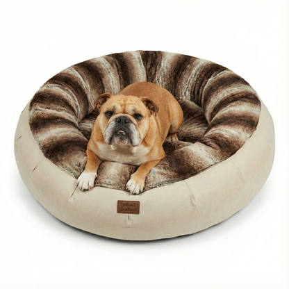 Dog lying on a round, striped calming donut pet bed with a visible brand logo.