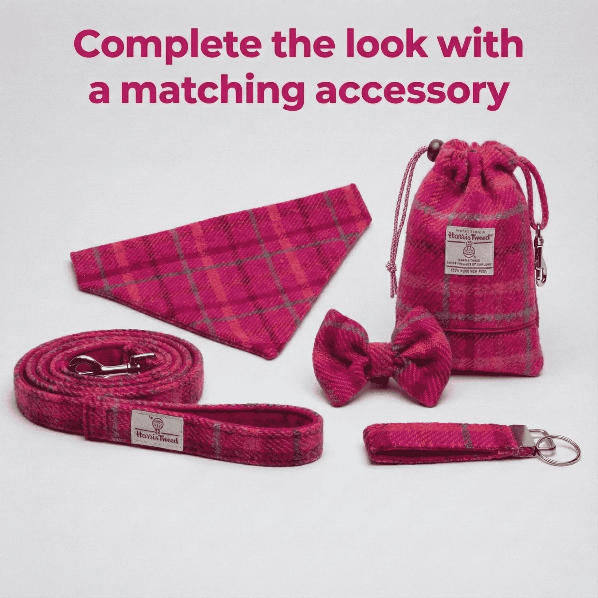 Pink plaid pet accessory set including a bow tie, leash, bandana, and pouch on a white background.
