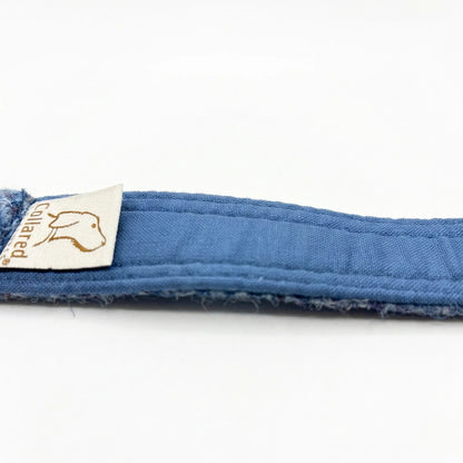 Close up of smooth blue Kona cotton lining inside a Collared Creatures Harris Tweed dog collar