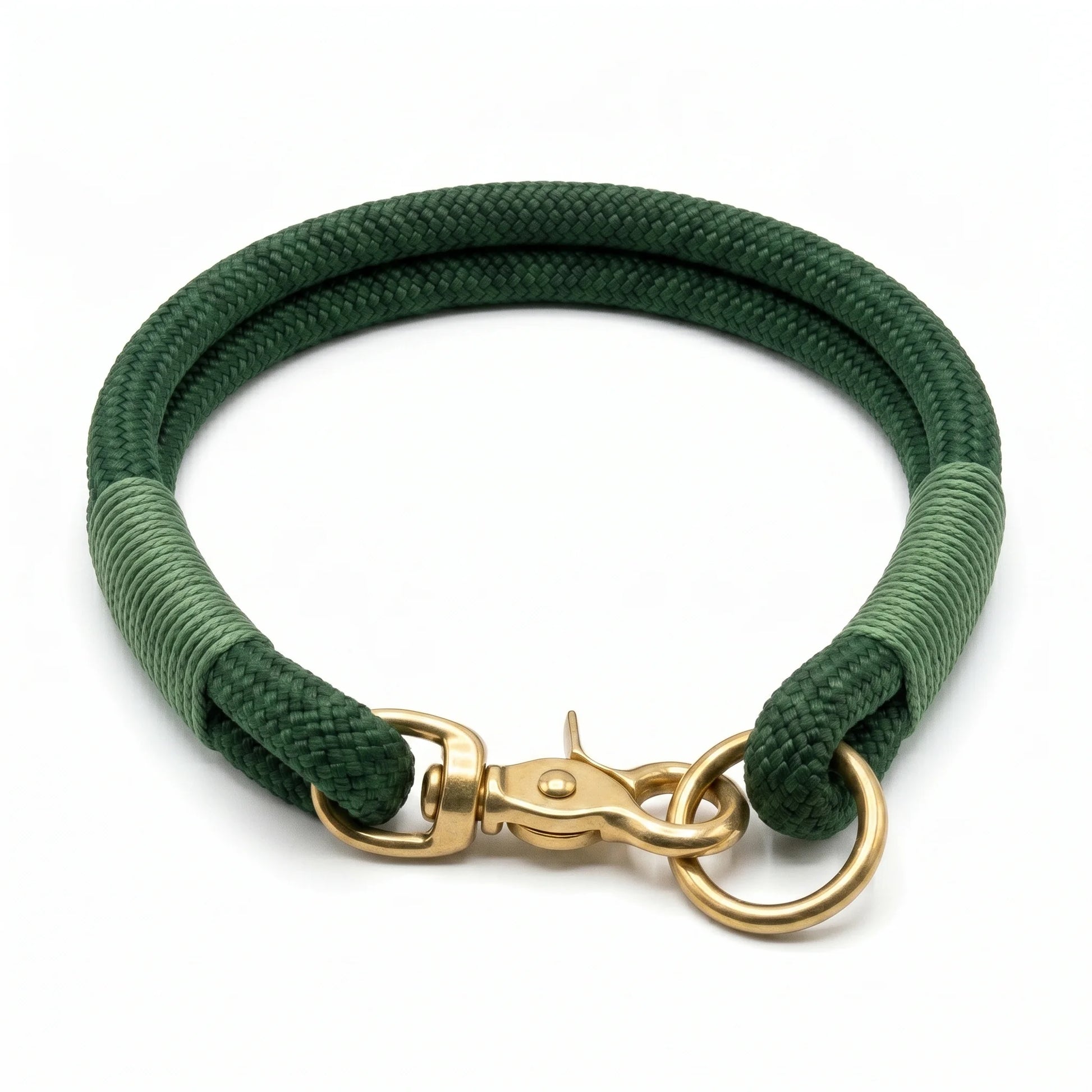 Green rope dog collar with gold clasp on a white background