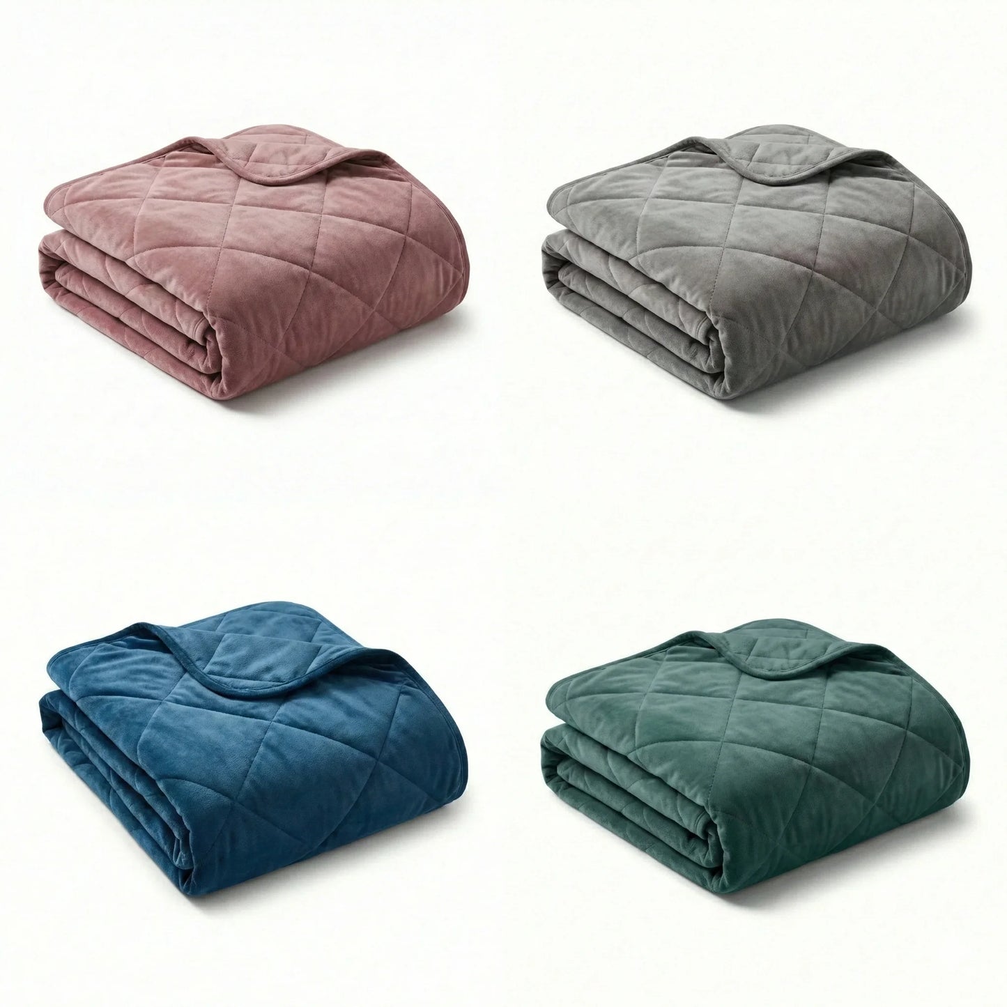 Four folded blankets in different colors on a white background