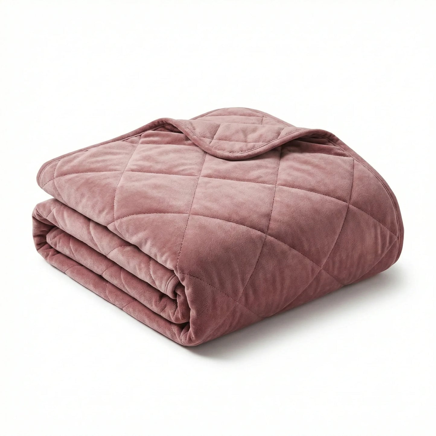 Folded pink weighted blanket on a white background