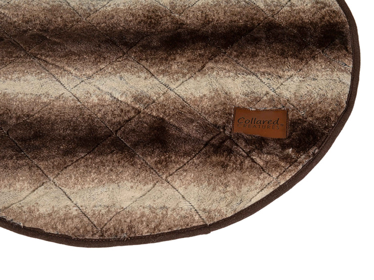 Flat quilted round dog bed blanket in brown faux fur for added comfort