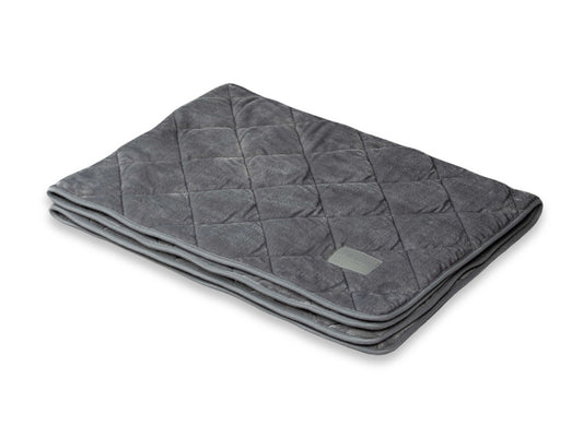 Folded grey quilted dog blanket showcasing premium quality and soft-touch finish.