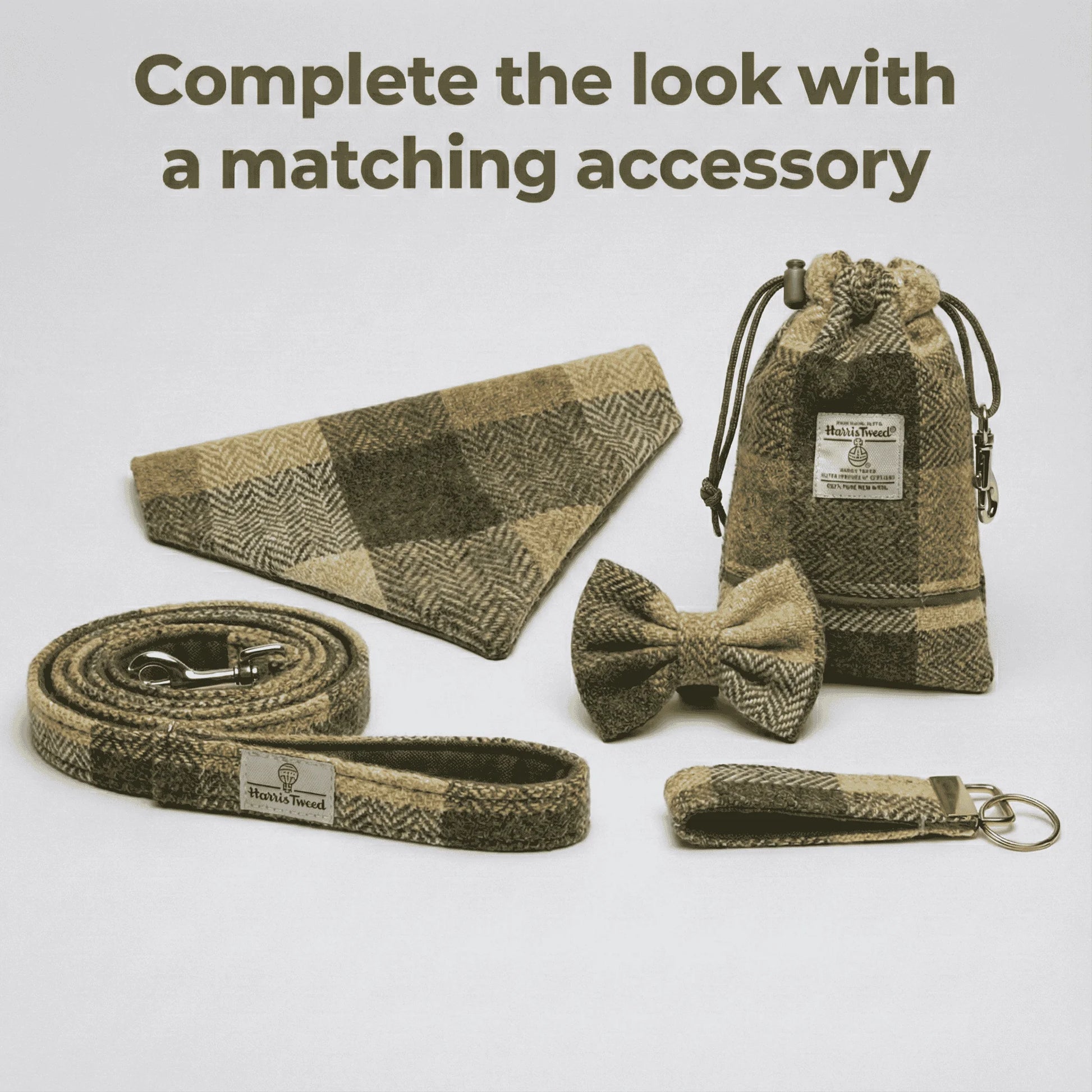 Set of matching accessories including a bow tie, dog collar, leash, and pouch on a light gray background.