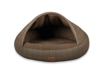 Studio shot of Collared Creatures cocoon dog bed in green tweed on white background