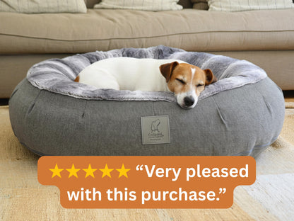 Grey Donut Dog Bed with small dog sleeping and customer review overlay: Very pleased with this purchase.