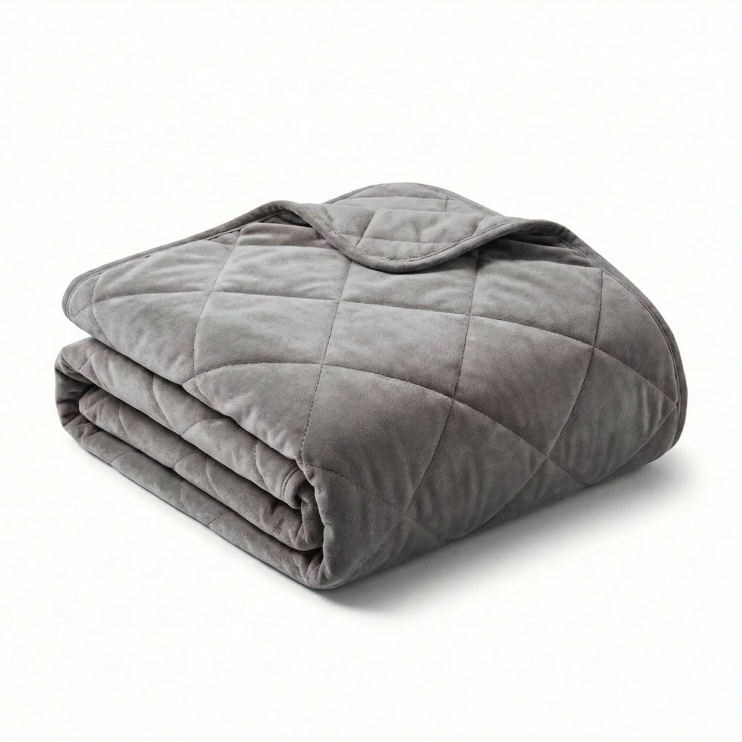 Folded gray weighted blanket on a white background