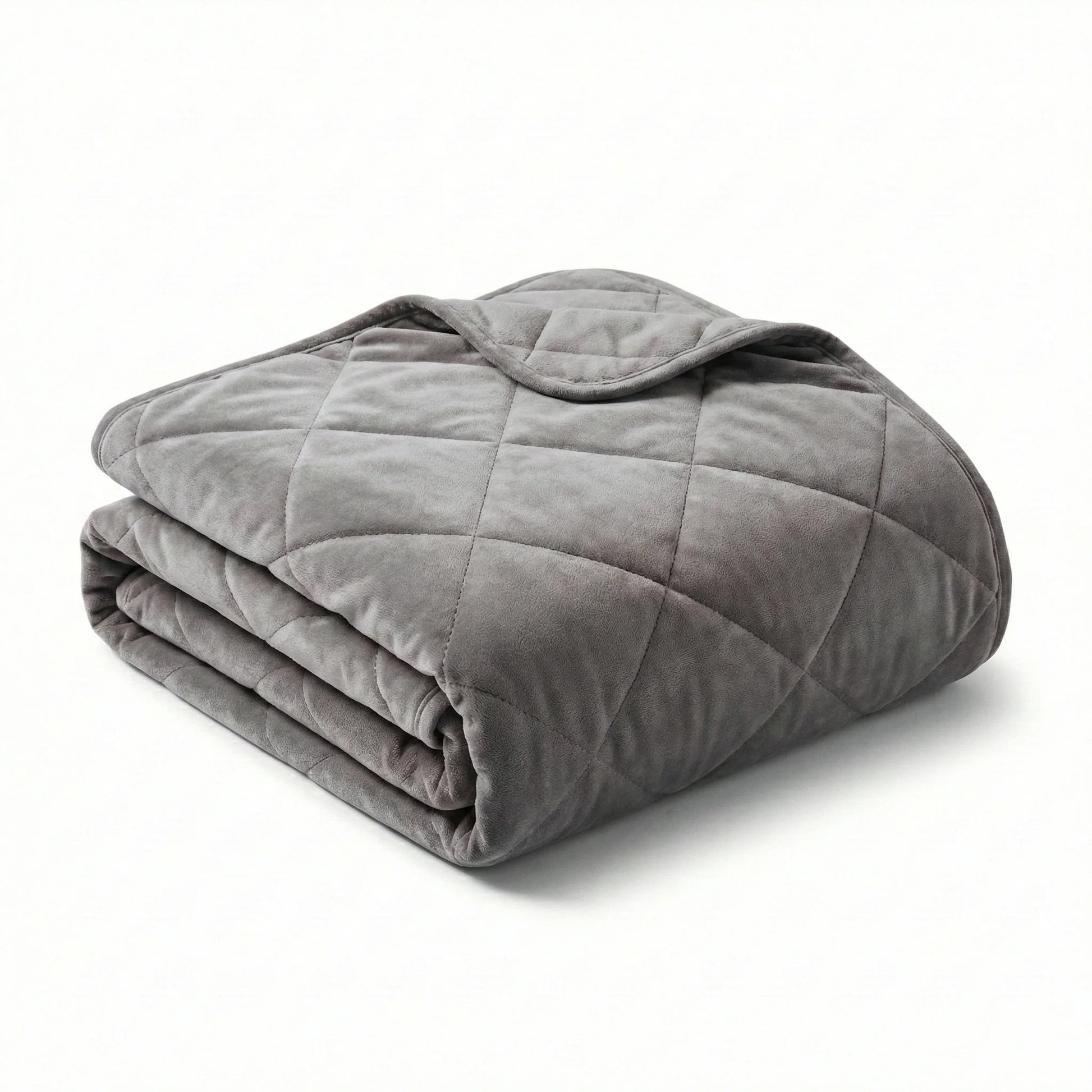 Folded gray weighted blanket on a white background