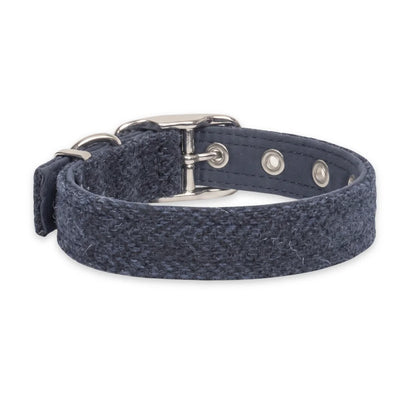 A navy blue woven fabric dog collar with a silver-tone metal buckle, D-ring, and adjustment snaps, shown on a plain white background.