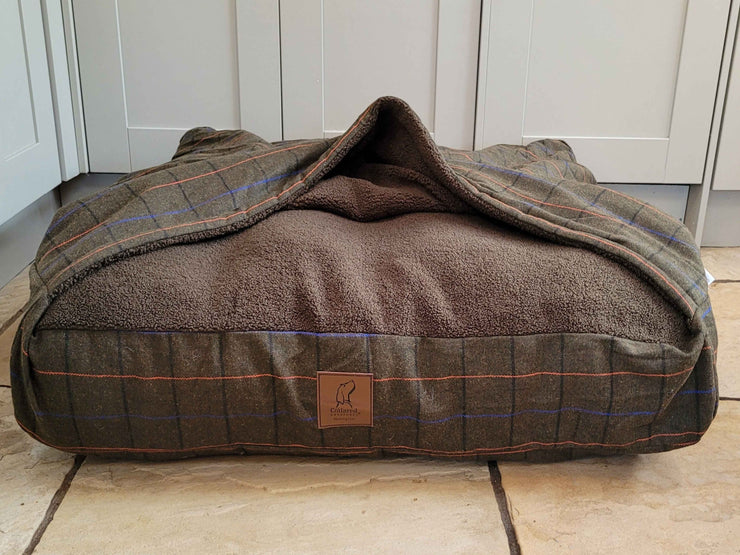 Front view of Collared Creatures Green Tweed Dog Snuggle Bed with open hood