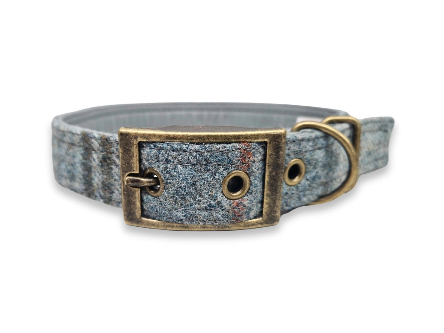 Dog collar with a textured abraham moon fabric design and brass buckle on a white background