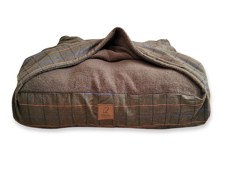 luxury dog snuggle bed with attached blanket 
