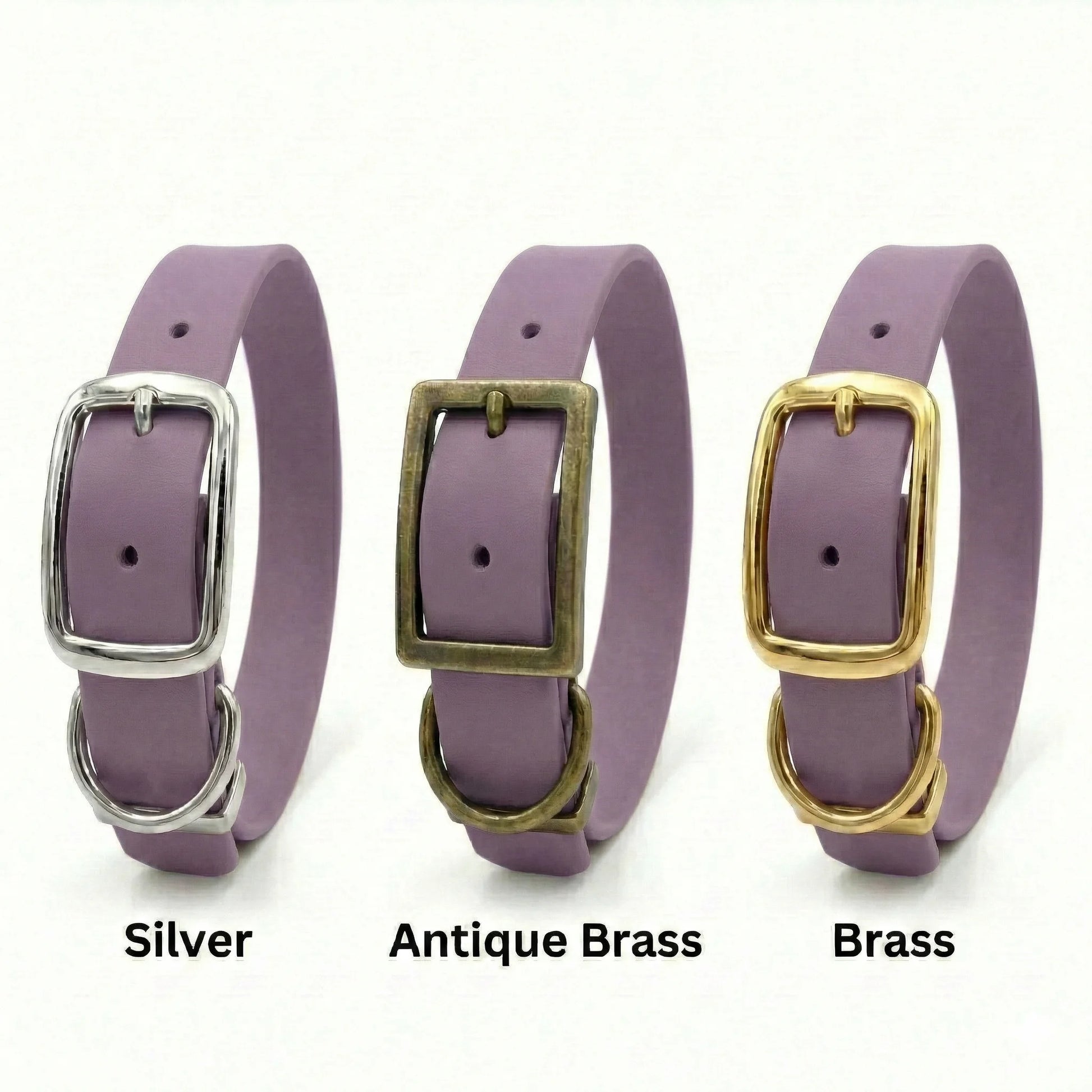 Three purple waterproof dog collars with silver, antique brass, and brass buckles on a white background.