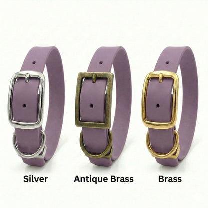 Three purple waterproof dog collars with silver, antique brass, and brass buckles on a white background.