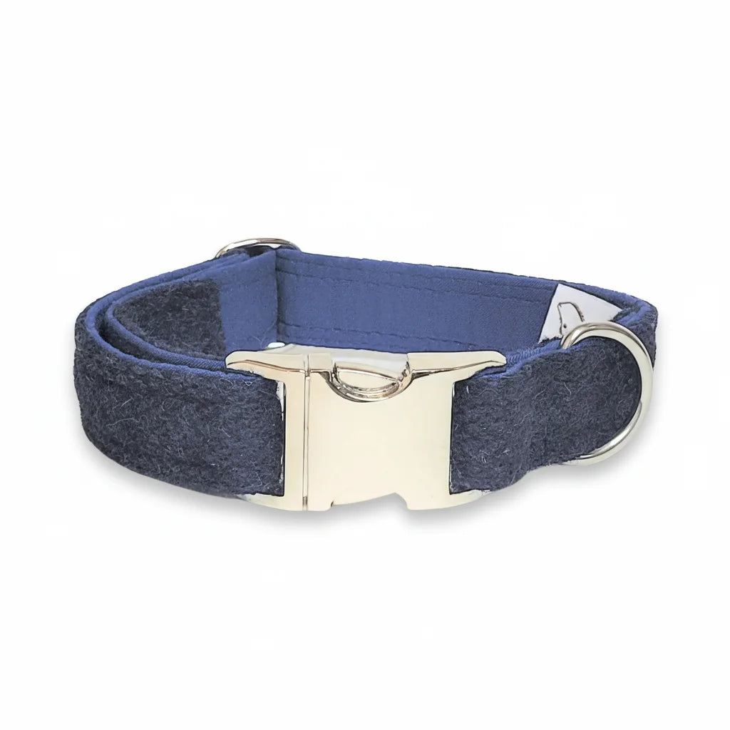 Midnight blue herringbone Harris Tweed dog collar with silver alumax clasp on a white background