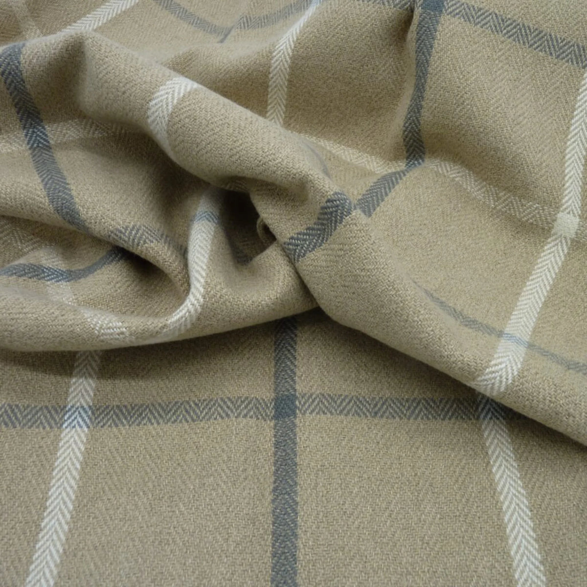 Close-up of Mull Latte herringbone check fabric in latte beige with navy and cream lines