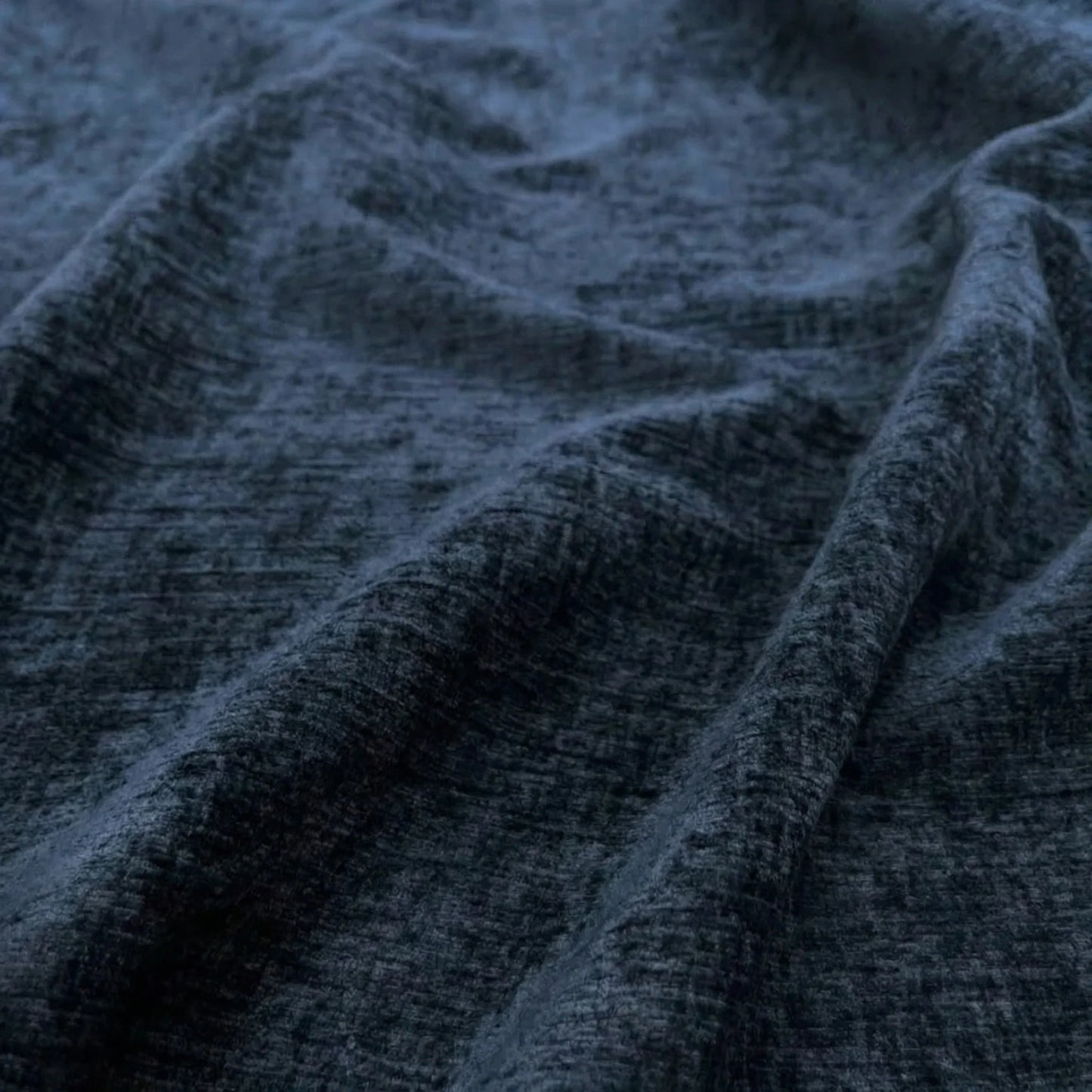 Close-up of textured dark blue fabric