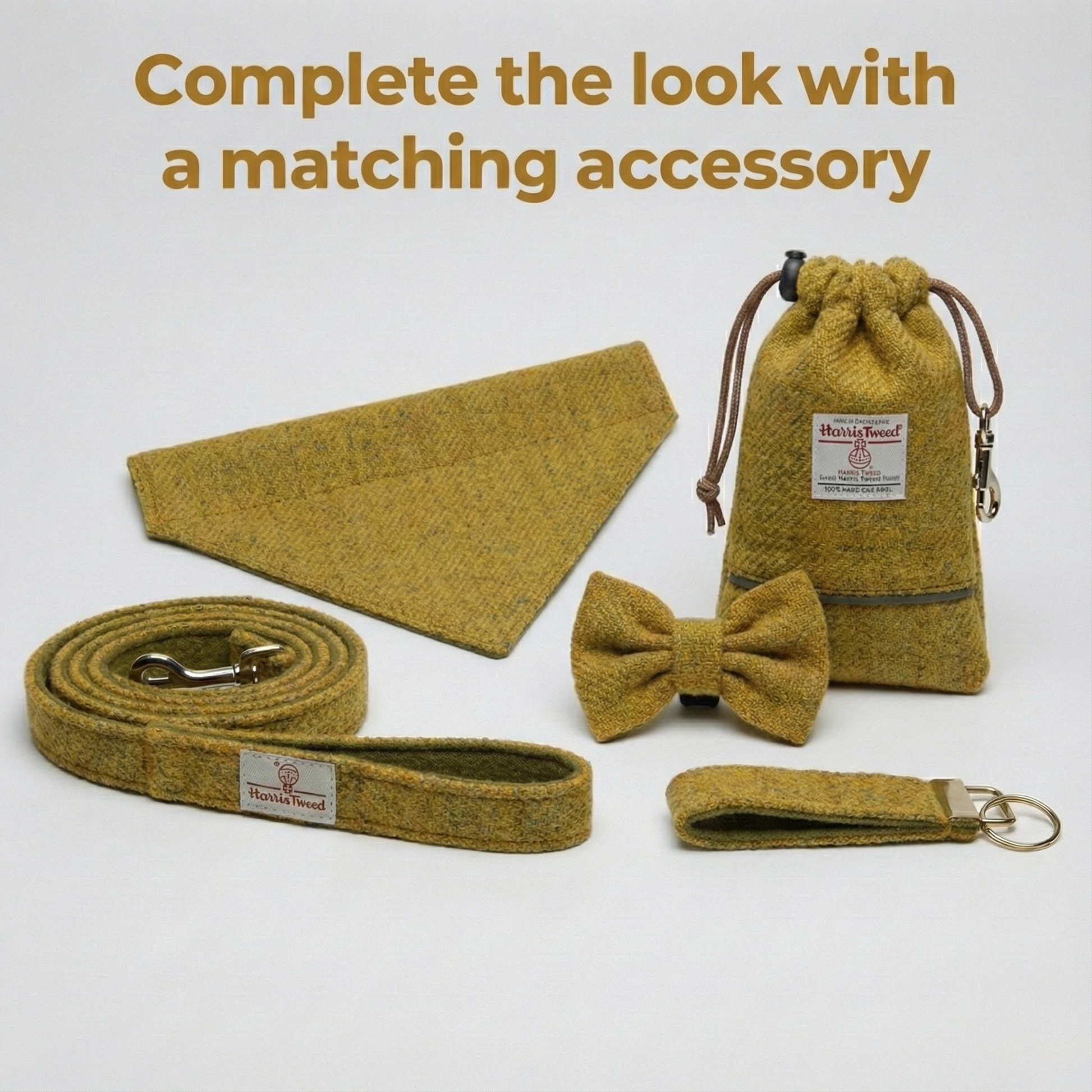 Set of yellow herringbone accessories including a bow tie, strap, and pouch on a white background.