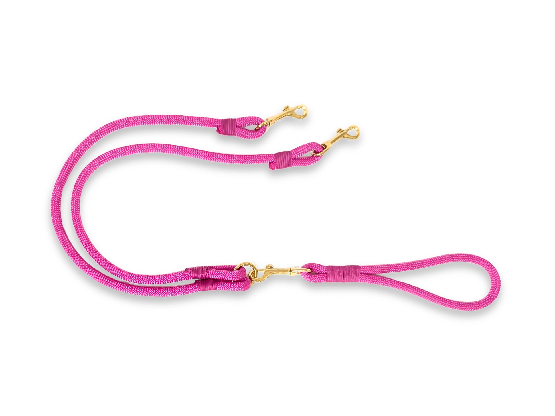 Pink dog leash with gold hardware on a white background