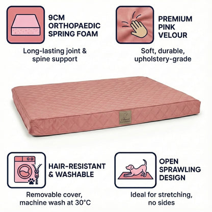 Pink pet bed with orthopedic features and washability details on a white background