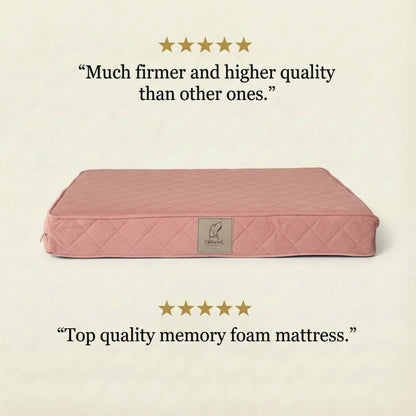 Pink memory foam mattress with five-star rating text on a beige background