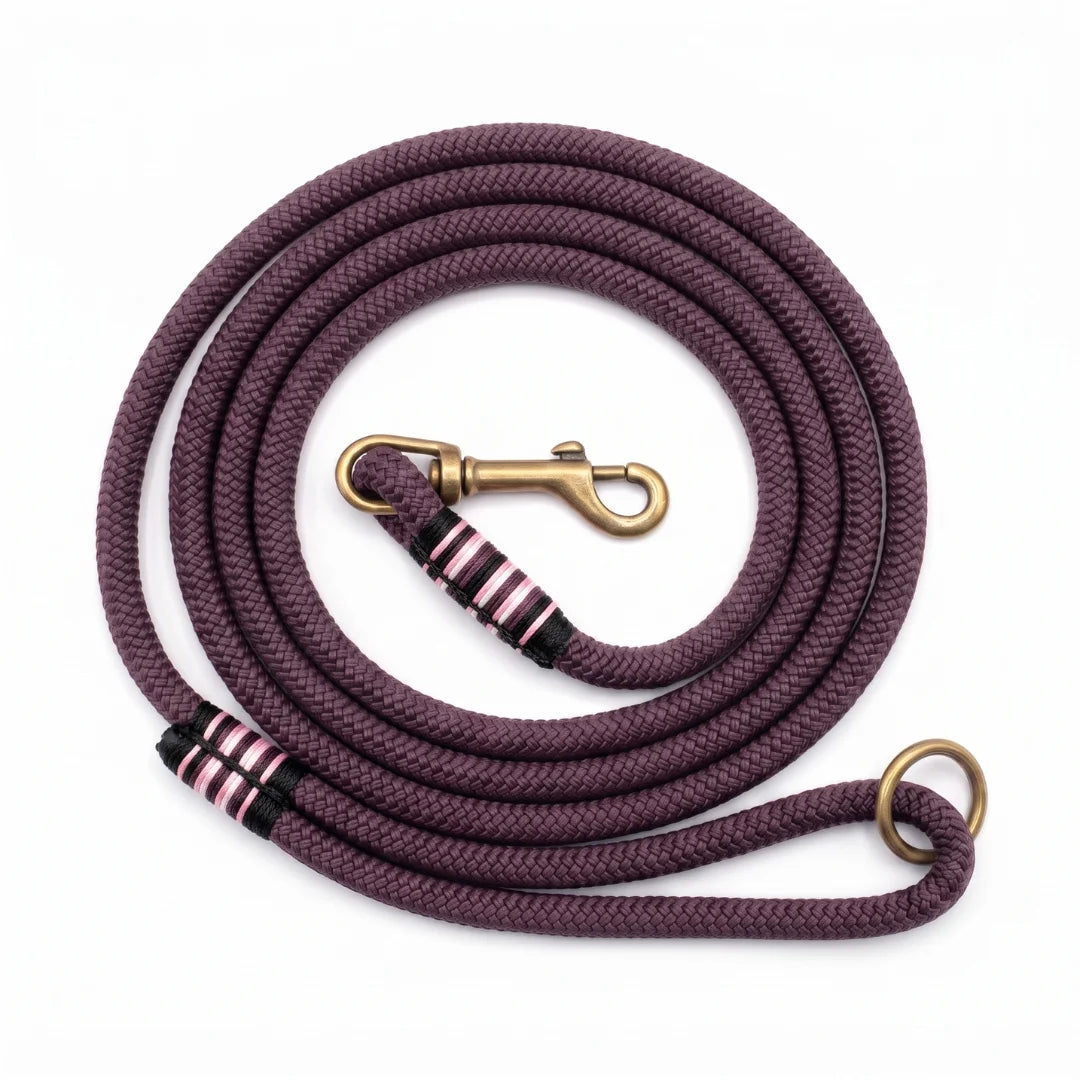mauve rope dog lead with whipping and snap hook on white background